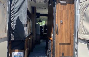 The Happy Camper (2023 Winnebago Travato 59G)