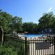 Hidden Acres Campground — pool surrounded by trees