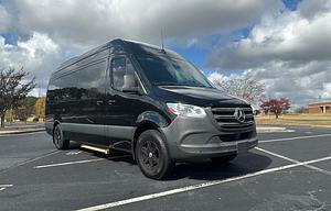 Luxury Mercedes-Benz Sprinter Party Bus/Limo with WiFi, TVs, and Big Sound