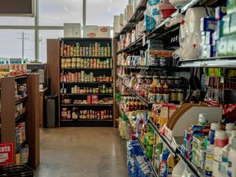 Interior photo of a store/general shop aisle — useful depiction of on-site convenience store/guest services (appears on the property's site).