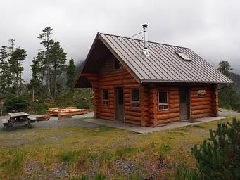 Middle Ridge Cabin with picnic table and tent platform