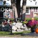 Decorated building facade with 'SMOKE RISE' painted on the barn-like structure and landscaping in front—good for showing on-site character and signage integrated into grounds. Source: Photo Gallery page.