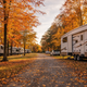 RVs parked at Kampers Lodge RV Park surrounded by fall colors in November