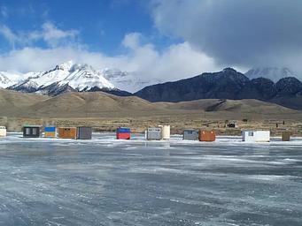 Ice fishing huts on the reservoir.
