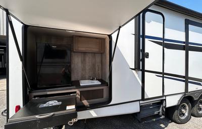 #24_Trailer w/ king, bed 4 bunks & outside kitchen
