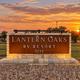 Lantern Oaks RV Resort entrance sign at sunset