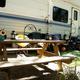 Close view of an RV site with picnic table and outdoor setup — shows typical campsite amenities and layout (page: https://www.woodsvalley.com/our-campgound/).