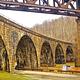 Outflow kayak/ canoe launch to the Conemaugh River. Also photo of 1907 Railroad bridge.