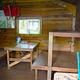 Eagle Lake Cabin interior showing table and two bunks.