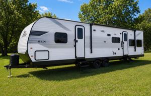 New & Loaded! 3 TVs • 2 Slides • Sleeps the Crew