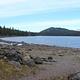 JUNIPER LAKE's Rocky Shoreline with peak in the background
