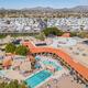High-resolution aerial view of the resort showing the central clubhouse, pool area, surrounding amenities and many RV sites — clearly depicts property layout and pool; matches site’s ‘Southern-Aerial-2’ page image.