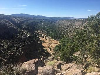 Looking down on an archaeological site from a trail overlook