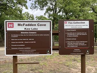 A photo of facility McFadden Cove with Boat Ramp, Picnic Table, Electricity Hookup, Sewer Hookup, Fire Pit, Shade, Tent Pad, Waterfront, Water Hookup
