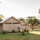 Serana lodge and barn exterior on the private retreat property
