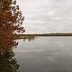Fall colors overlook the gathering pond at Outlet Park