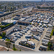 High-angle aerial view of the entire RV park showing site layout, drive aisles and surrounding streets — matches the site’s aerial/footer image and clearly depicts the property footprint.