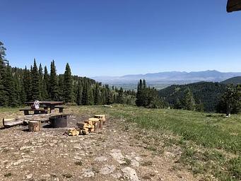 Fire ring and picnic table with views of the Bridger Mountain Range to the North