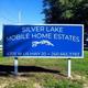 Entrance/site sign reading “Silver Lake RV Estates” — clear on-site identifier confirming property location.