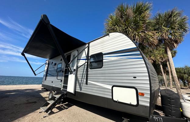 Fully furnished travel trailer for a small family.