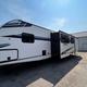 #24_Trailer w/ king, bed 4 bunks & outside kitchen