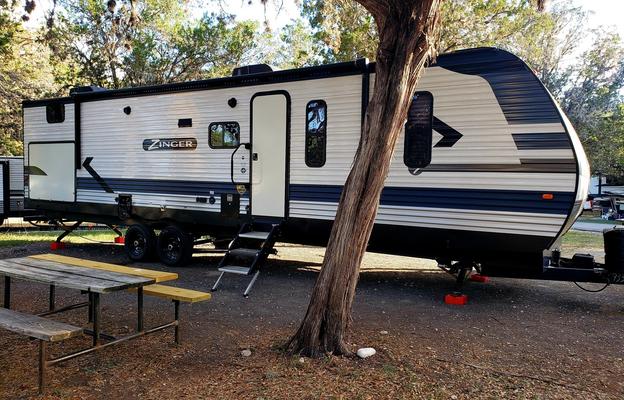 Pride of Texas Family Friendly Zinger RV