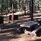 Shaded picnic area with bear boxes