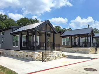 Tiny home exterior with a screened porch