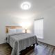 Bedroom photo from a bunk-house style unit, useful to show another accommodation type available on the property (source page: Rooms | Southern Breeze Lodge).