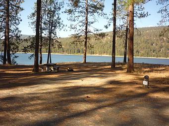 Kettle Falls CG with trees and water in the background.
