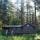 Virginia Lake Cabin underneath tall trees
