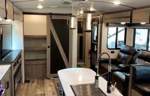 The ⁠Keystone Outback 340BH luxury travel trailer
