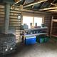 Inside Twogood Cabin cooking area and wood stove