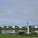The lighthouse monument beside the pond at Beacon 44 RV Park