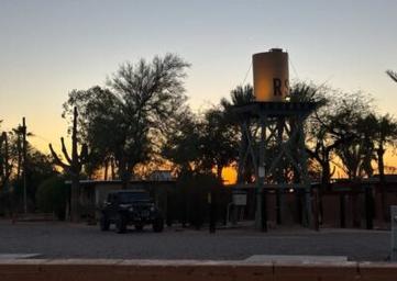 Twilight view featuring a water tower and park structures — captures unique on‑site features and evening atmosphere (file RS-400x284.jpg).