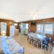 Interior photo of a cottage/cabin living/dining area — useful for rental/accommodation gallery (file appears on the property site listing cottages).