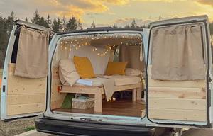 The Timber Den — Cozy Cabin Camper with Solar