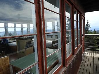 View from catwalk through windows to the inside of the lookout. 