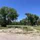 A photo showing the entire campground area of Deerlodge Park Campground with Cottonwood Trees
