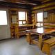 Middle Ridge Cabin interior with wood table and shelves