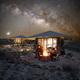 Luxury safari tent with a private deck, campfire, and views of the Milky Way for private stargazing at Camp Elena in Terlingua, Texas, near Big Bend National Park.