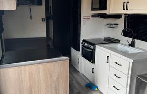 Sam’s Cozy Family Camper!