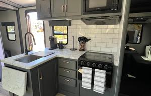 The Farmhouse travel trailer.