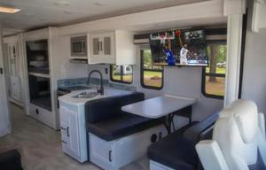A01 - 10 Person w/ Bunk - The RV Rental Factory