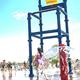 Splash pad play feature with water bucket and active fountain area — good depiction of family water amenities (matches Events/Pool imagery on the website).