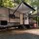 RV parked at a full-hookup campsite at Spirit of the Suwannee Music Park