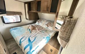 Fully furnished travel trailer for a small family.