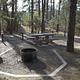 Accessible White Spar Site 10 with pull-in parking and flat graveled table and fire pan