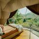 Inside the River Dome â geodesic dome interior with panoramic canyon views and cozy bed
