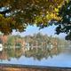 Scenic lake view framed by trees and shoreline — shows the campground’s lakeside setting and nearby cottages/shoreline (homepage slideshow at https://www.tippicanoe.com/).